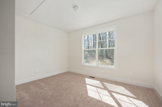 view of carpeted spare room