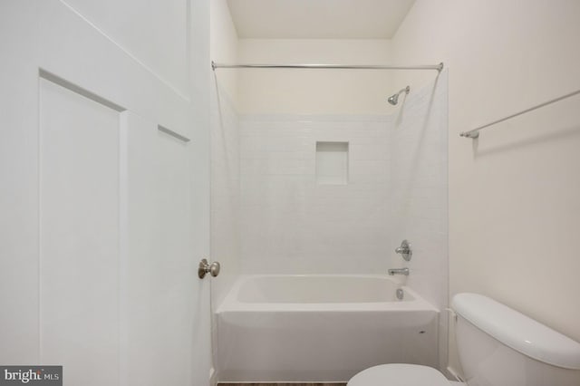 bathroom with shower / tub combination and toilet