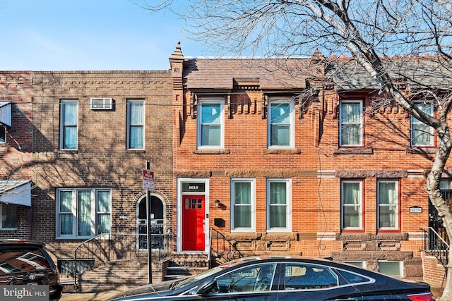 multi unit property featuring brick siding