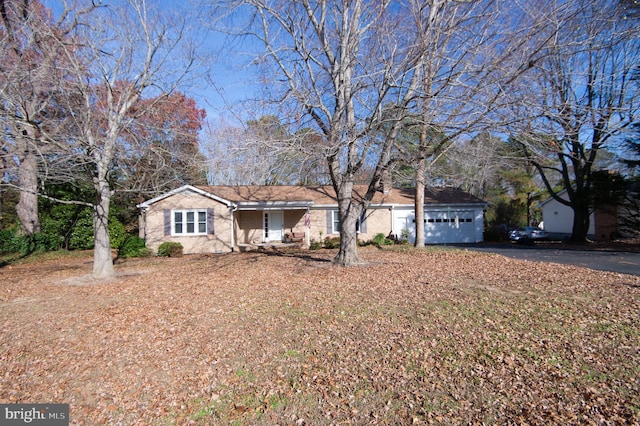 ranch-style home with a garage