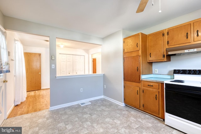 kitchen featuring electric range, ceiling fan, and ventilation hood