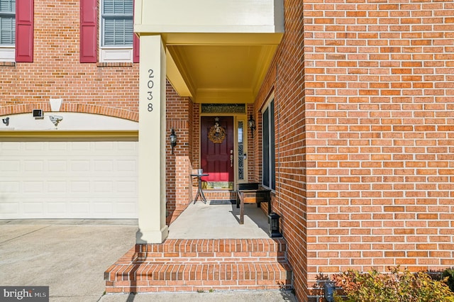 property entrance with a garage