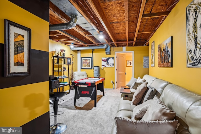 recreation room featuring light colored carpet