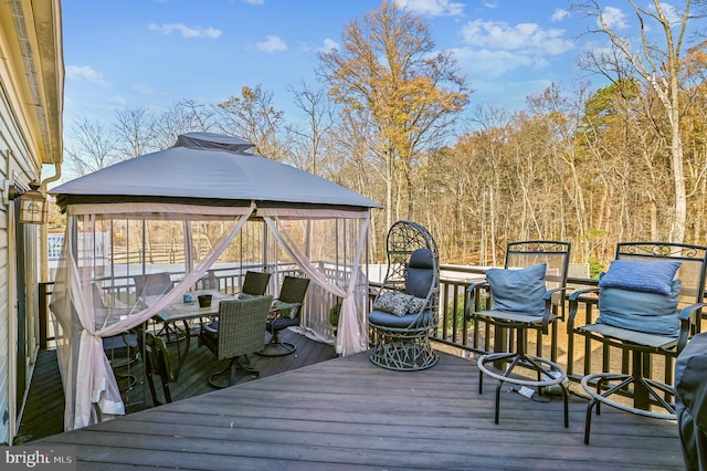 wooden deck with a gazebo