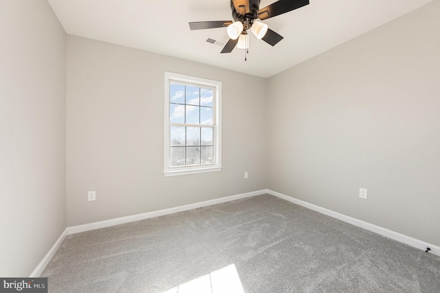 unfurnished room featuring carpet floors and ceiling fan