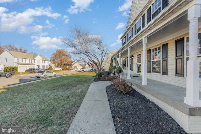 view of yard with a porch