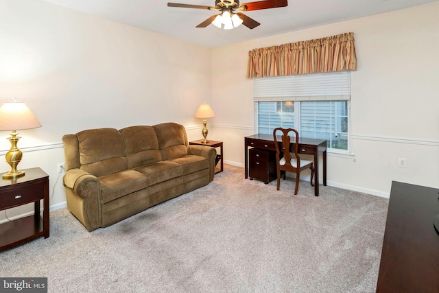 living room featuring ceiling fan and light colored carpet