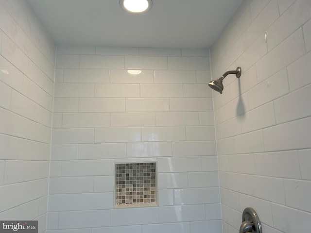 room details with a tile shower