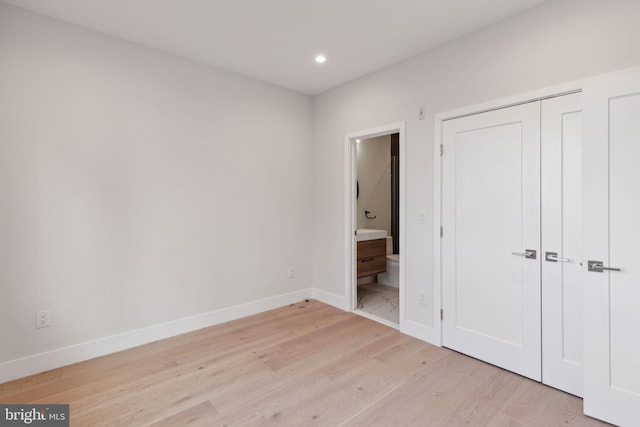 1610 Germantown Ave Unit C, Philadelphia, PA 19122 - unfurnished bedroom featuring light wood-type flooring, recessed lighting, and ensuite bath