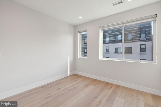 empty room featuring light hardwood / wood-style floors