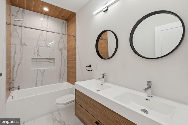 1610 Germantown Ave Unit C, Philadelphia, PA 19122 - bathroom featuring washtub / shower combination, marble look tile flooring, double vanity, and recessed lighting