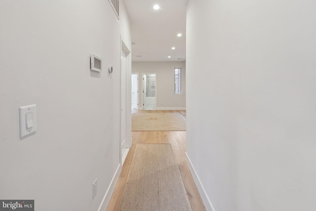 corridor featuring light wood-type flooring