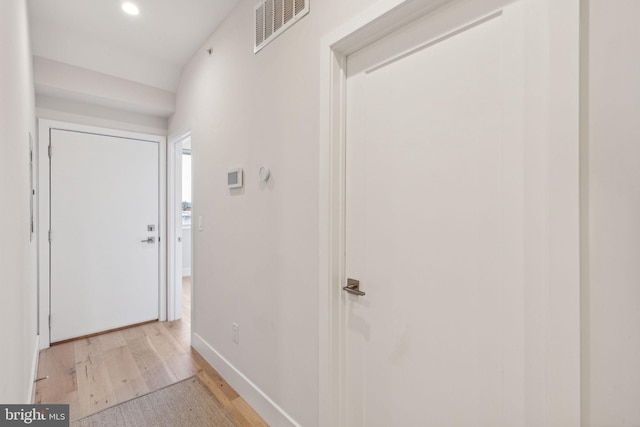 hallway featuring light wood-type flooring