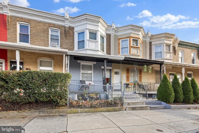 multi unit property featuring covered porch