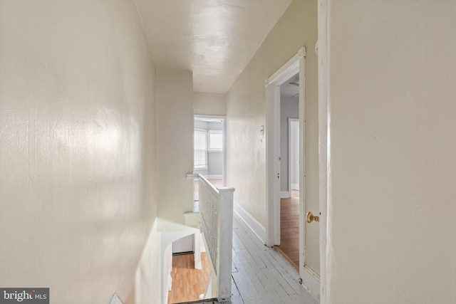 hallway featuring light hardwood / wood-style flooring