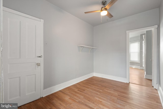 unfurnished room with ceiling fan and light hardwood / wood-style floors