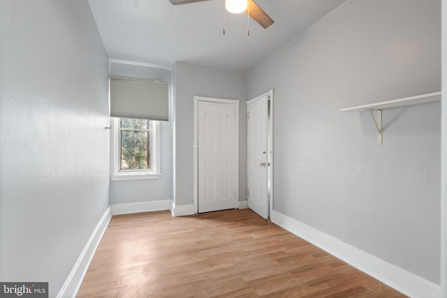 unfurnished bedroom featuring ceiling fan and light hardwood / wood-style floors