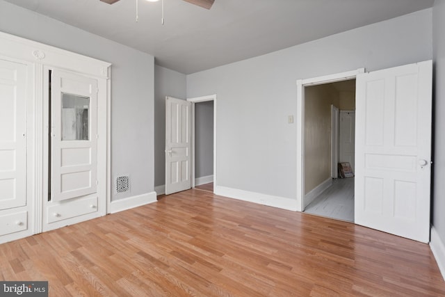 unfurnished bedroom with light hardwood / wood-style floors and ceiling fan