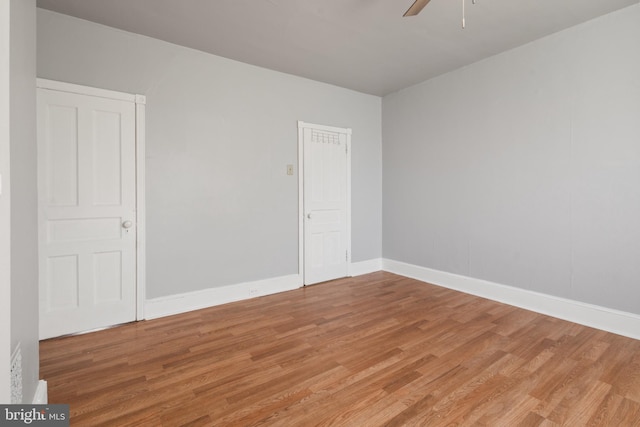 unfurnished room featuring ceiling fan and light hardwood / wood-style flooring