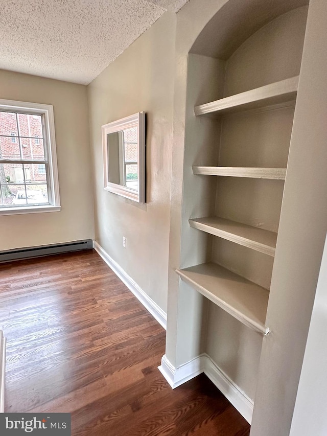 interior space with baseboard heating