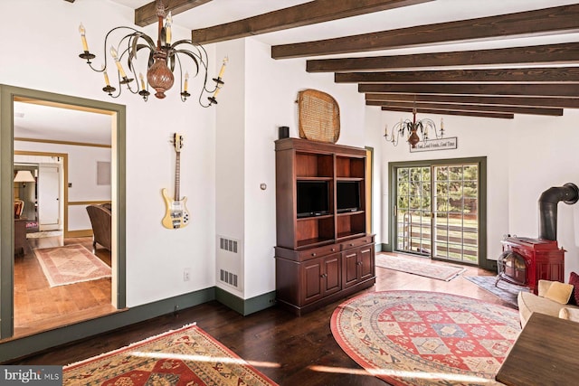 living room featuring a wood stove, dark wood-type flooring, and vaulted ceiling with beams