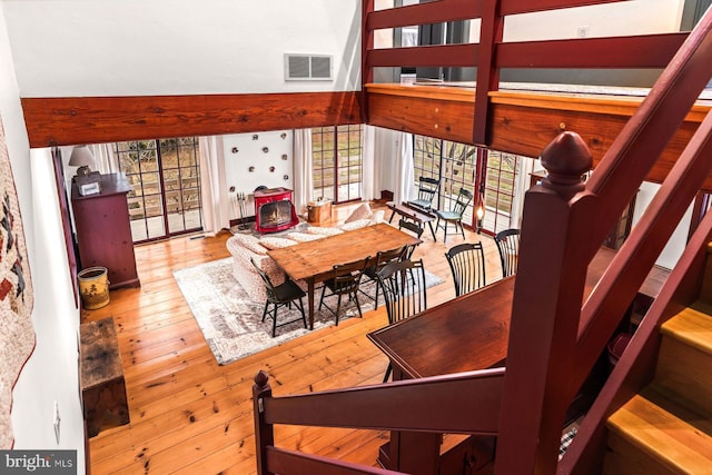 dining room with a healthy amount of sunlight and light wood-type flooring