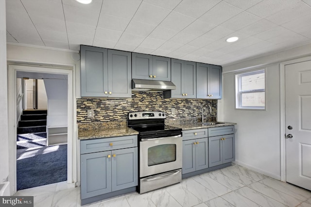 kitchen featuring dark stone countertops, backsplash, stainless steel range with electric cooktop, and sink