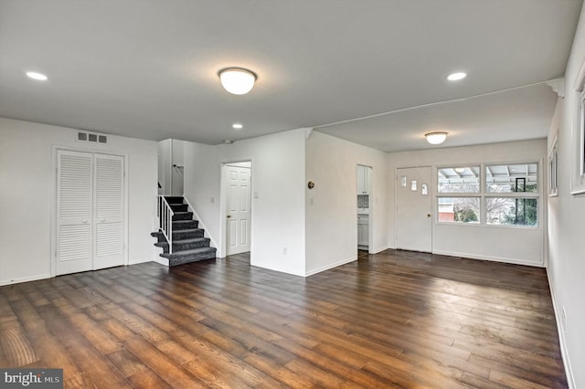 interior space with dark hardwood / wood-style floors