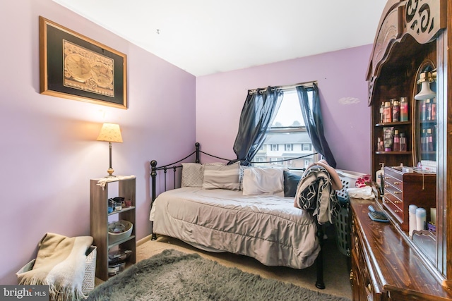 bedroom featuring carpet flooring