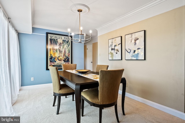 dining room with a chandelier, light colored carpet, and crown molding