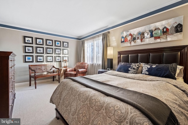 carpeted bedroom featuring crown molding