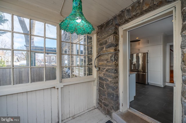 view of unfurnished sunroom