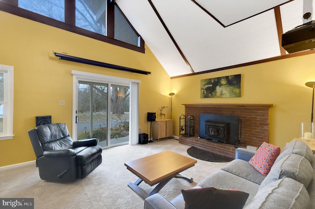 carpeted living room featuring a wood stove and high vaulted ceiling