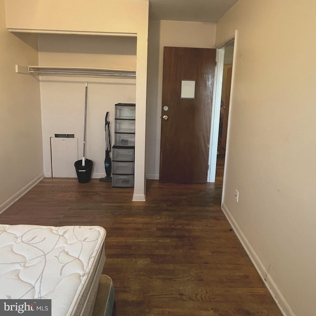 hallway featuring dark wood-type flooring