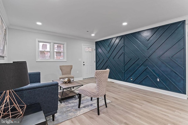 interior space featuring light hardwood / wood-style floors and crown molding