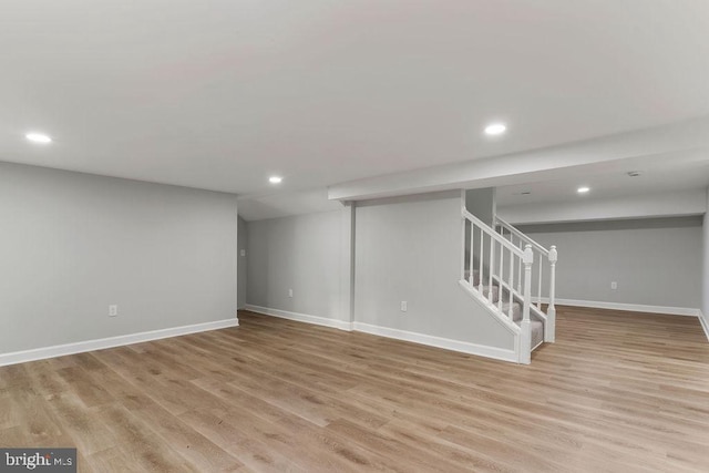 basement featuring light hardwood / wood-style floors