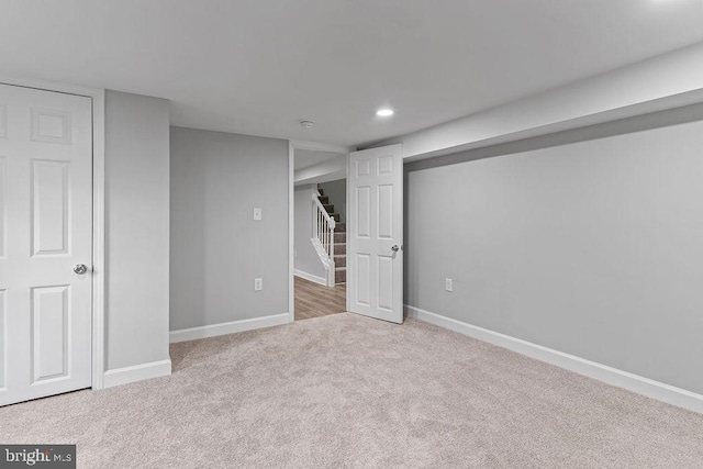 basement with light carpet