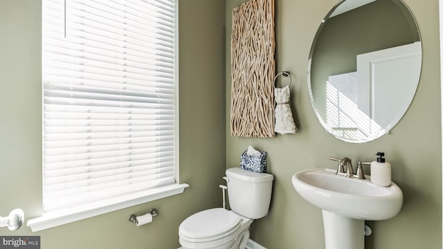 bathroom with sink and toilet