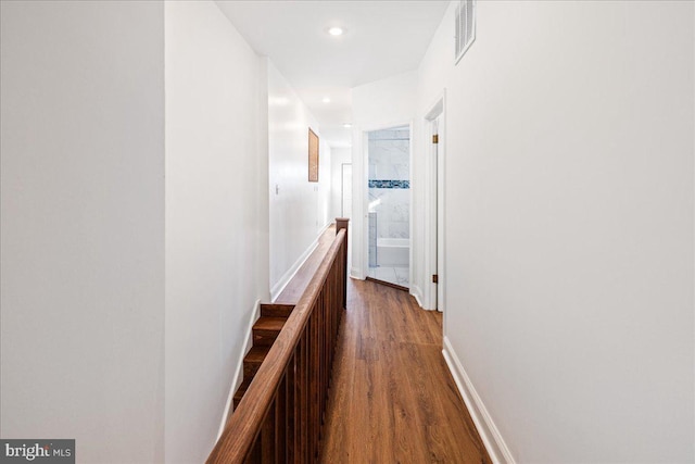 hallway featuring hardwood / wood-style floors