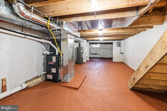 basement with heating unit and water heater