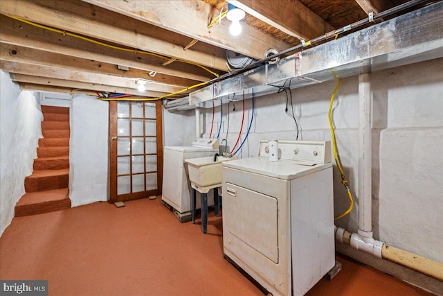 laundry area with washer and dryer