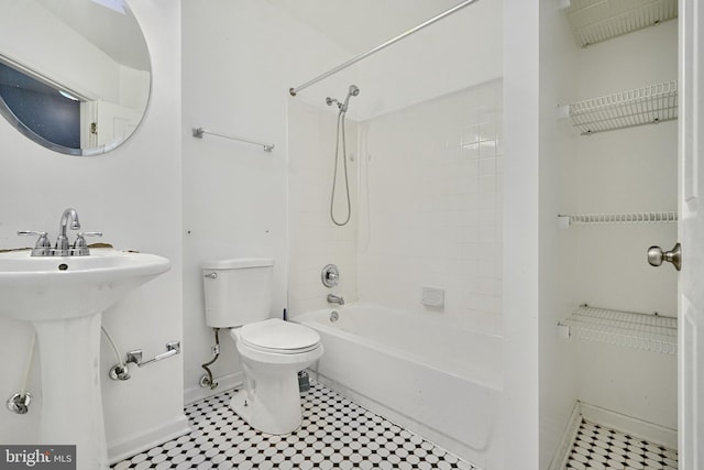 full bathroom featuring shower / bathing tub combination, toilet, and sink