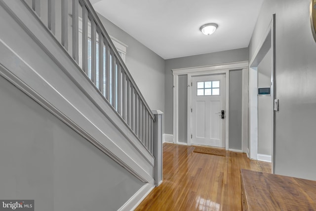 foyer with light hardwood / wood-style floors