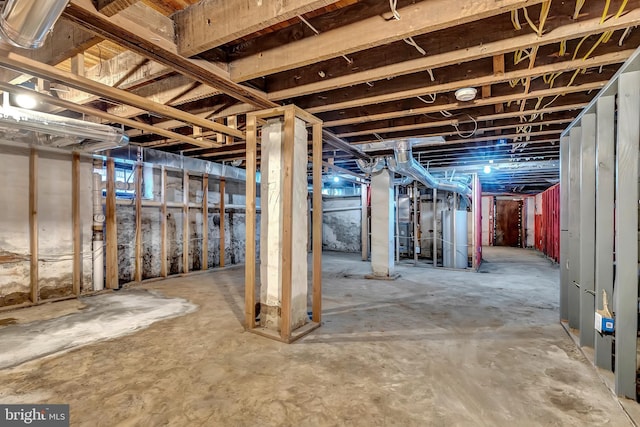 basement featuring water heater