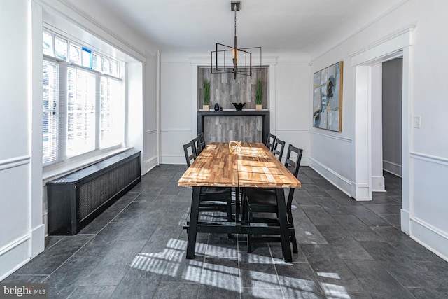 dining area with a chandelier