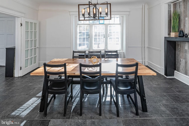 dining room with a chandelier