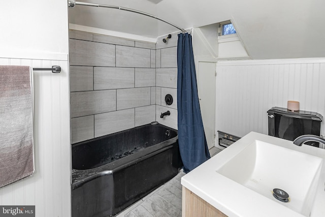 bathroom featuring vanity and shower / tub combo