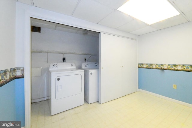 laundry room with washer and clothes dryer