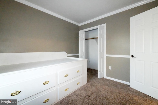 unfurnished bedroom with carpet floors, a closet, and crown molding