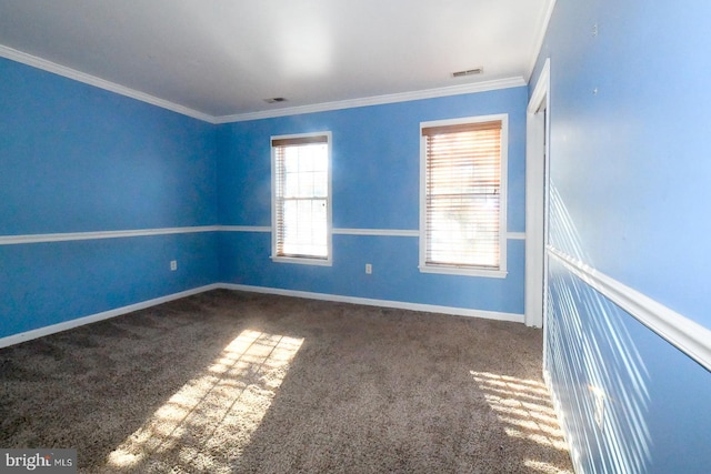 carpeted spare room with ornamental molding